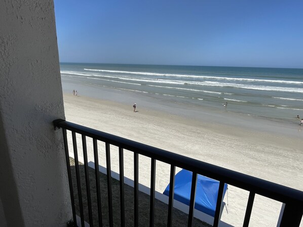 On the beach, sun-loungers