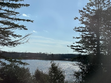 Lake and sunset view from the  Master Bedroom. Wake up to this beauty!
