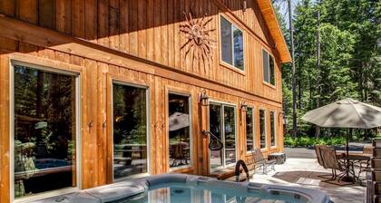 Theater, Hot Tub & River Access. This home was built for big groups!