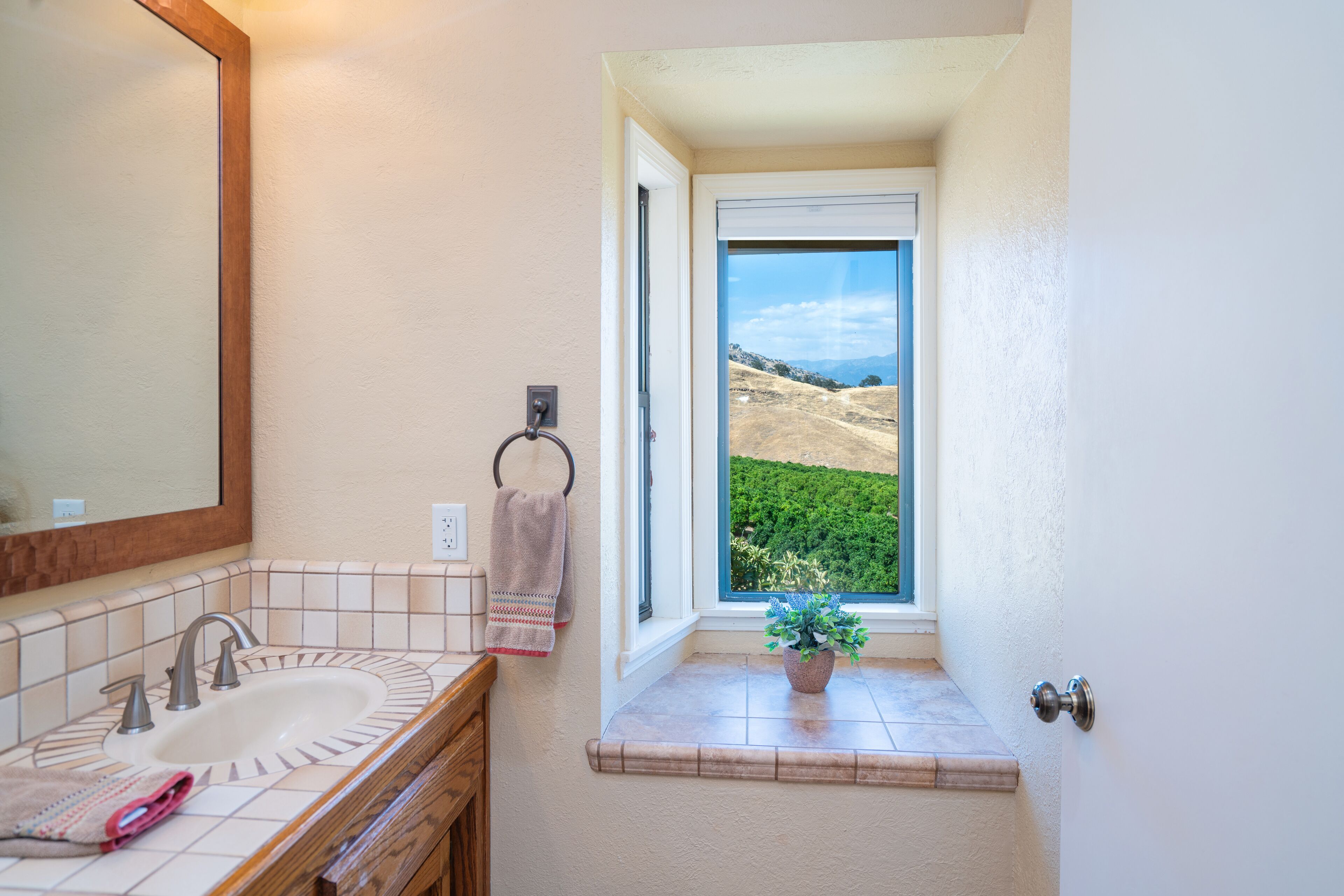 Combined shower/tub, hair dryer, towels, soap