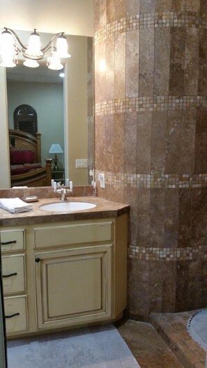 Combined shower/bathtub, hair dryer, towels, soap