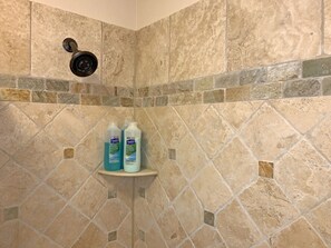 Combined shower/tub, hair dryer, towels, soap