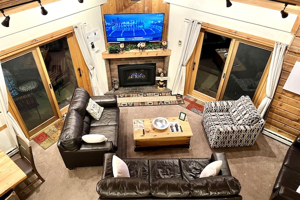 Looking down from the Loft at the TV and fireplace in the living room.