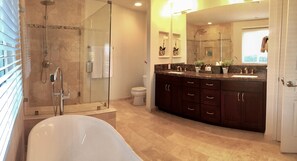 Bathtub, hair dryer, towels, soap