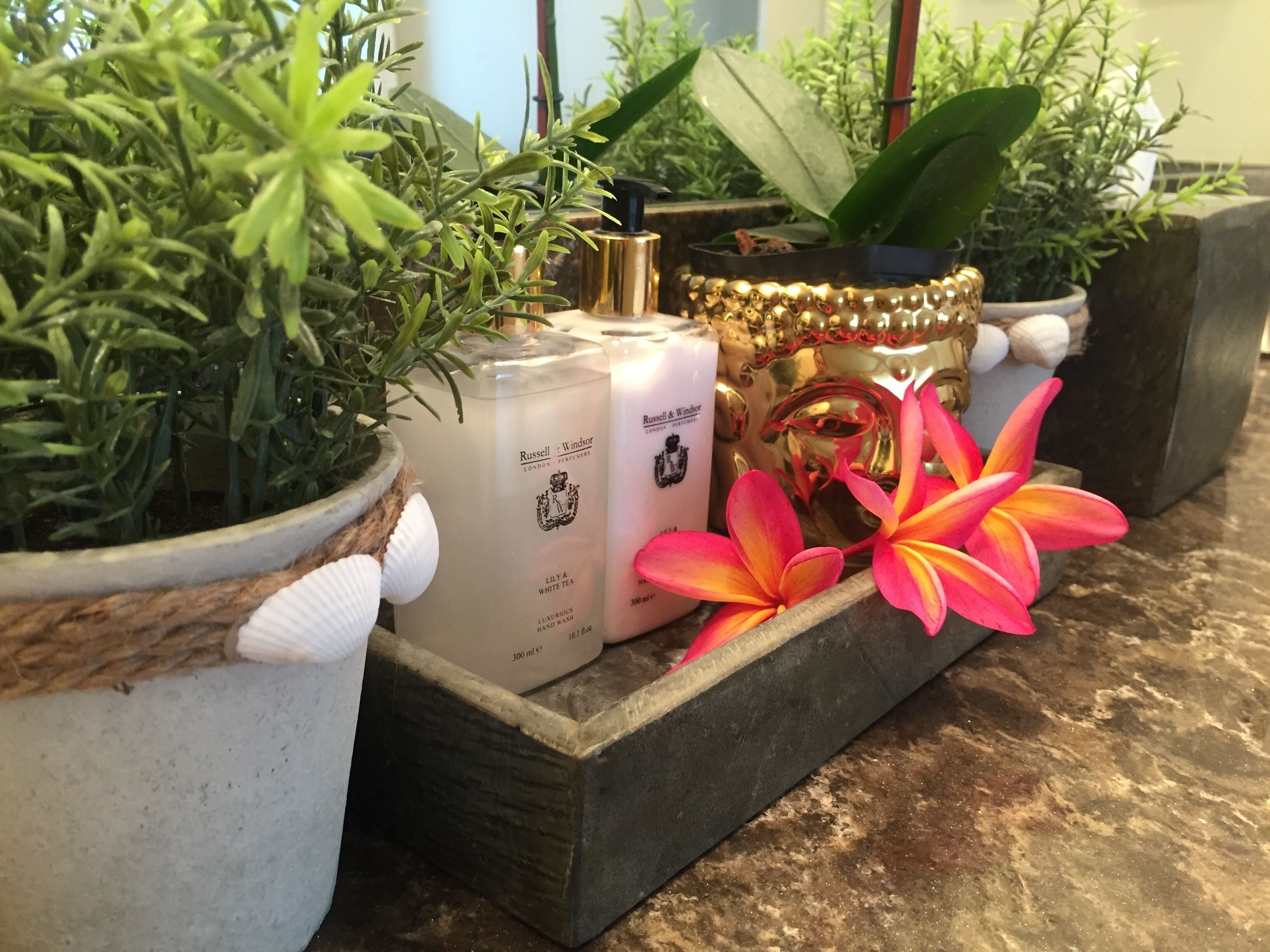 Bathtub, hair dryer, towels, soap