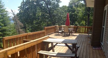 Experience Kentucky Lake out the back door! Spacious 4-bedroom retreat awaits.