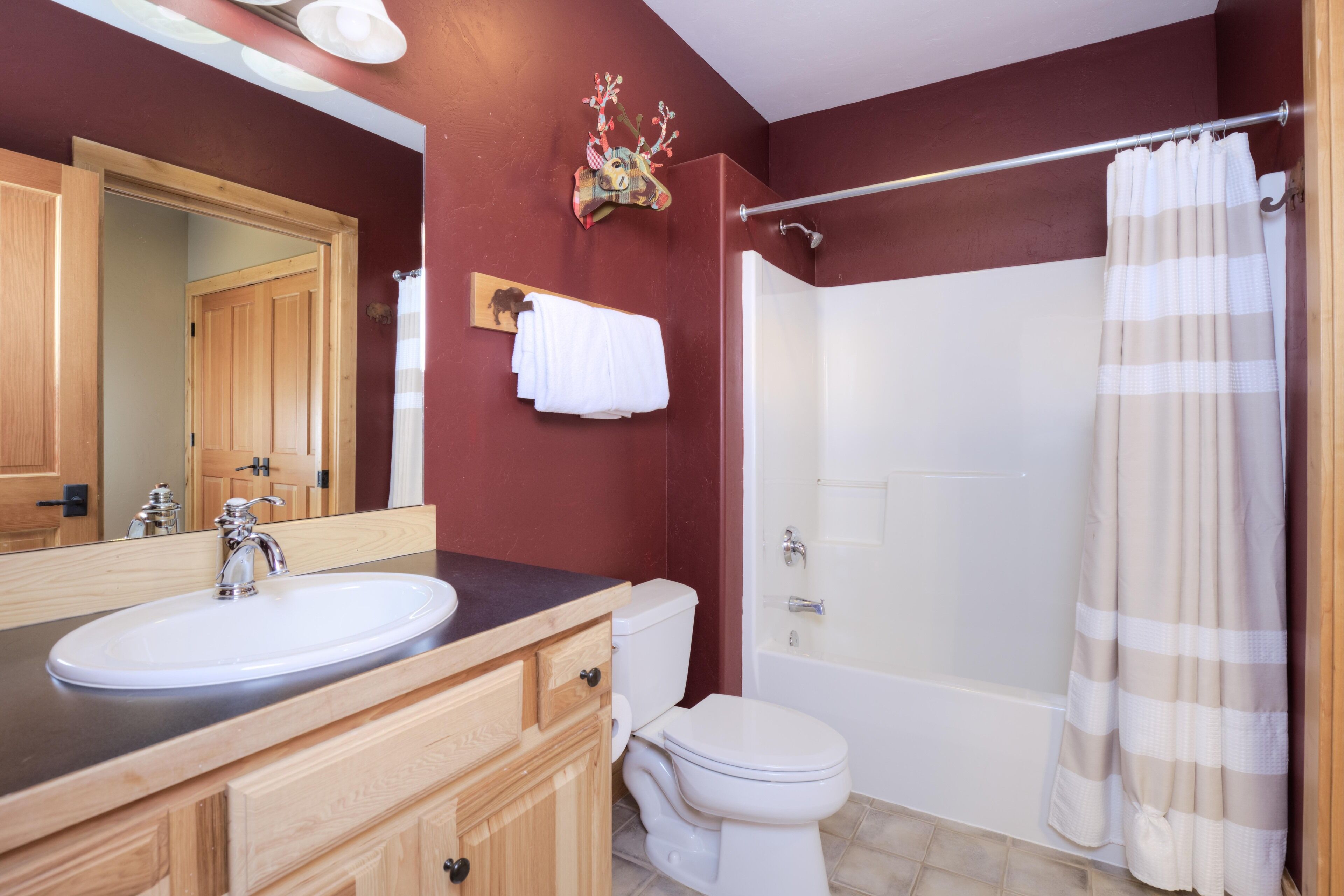 Combined shower/tub, hair dryer, towels, soap