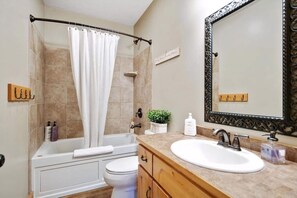 Hair dryer, towels, soap, shampoo