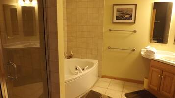 Shower, jetted tub, hair dryer, towels
