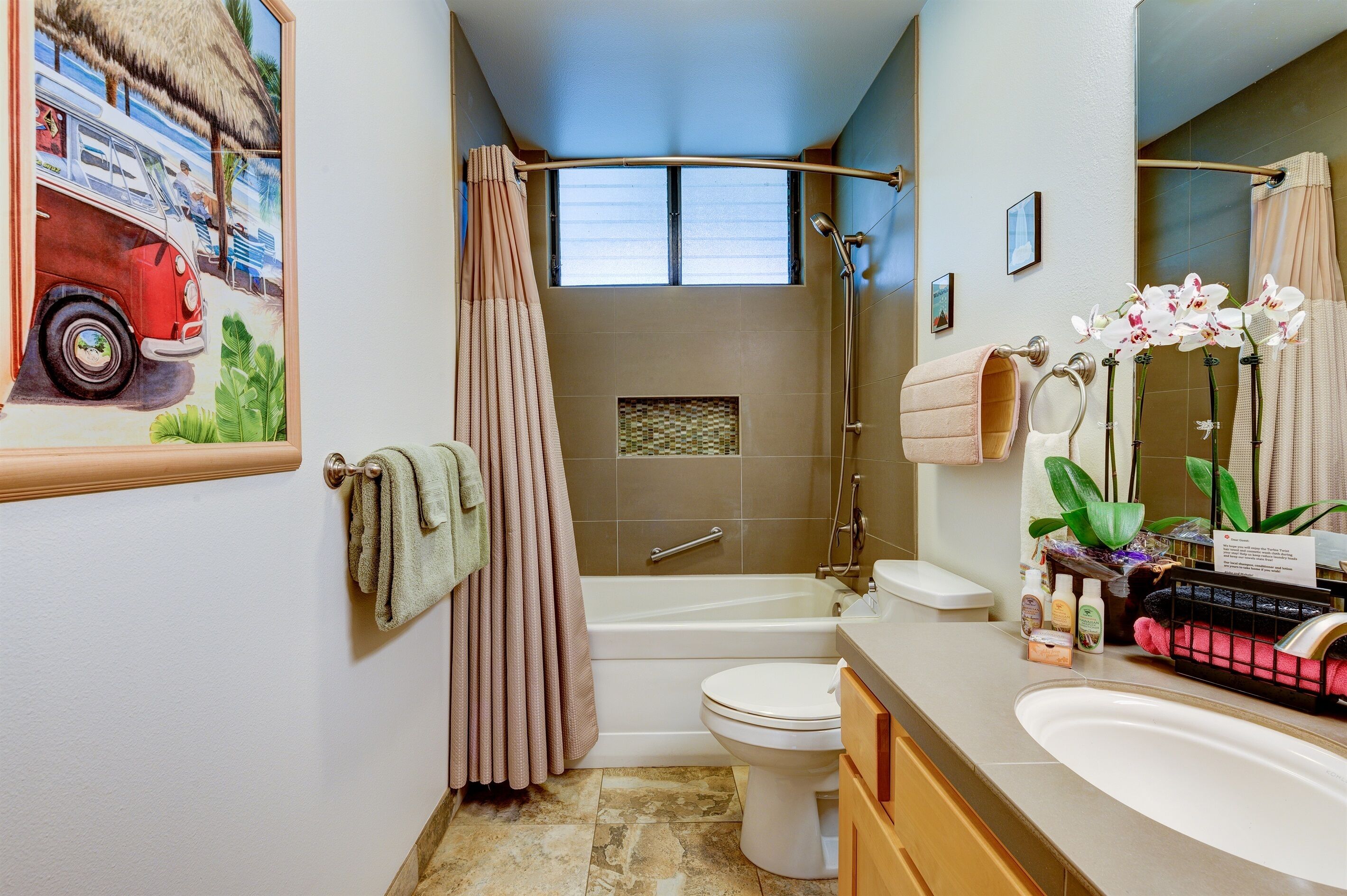 Combined shower/tub, hair dryer, towels, soap