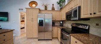 WALK or BIKE to beach - Private, Heated Pool, Spacious - Outdoor LUXURY Awaits!