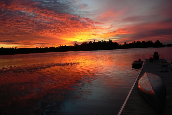 sunrise from main dock on Grape Island