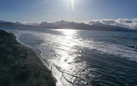 On the beach. For less than two hotel rooms, stay on the Spit and sleep 7!