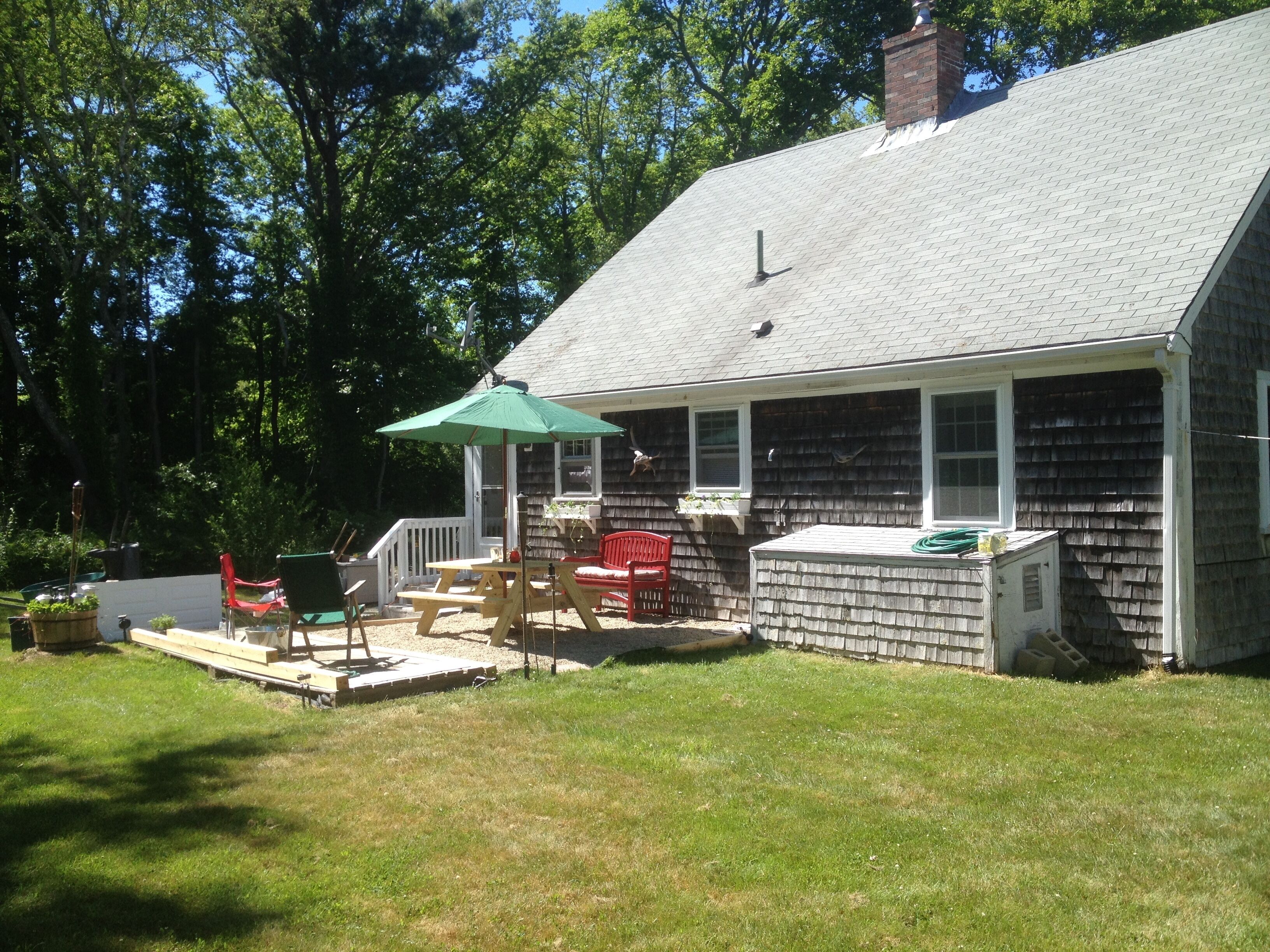 Back yard with patio and picnic table