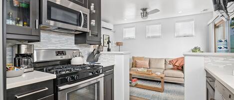 Fridge, microwave, dishwasher, coffee/tea maker