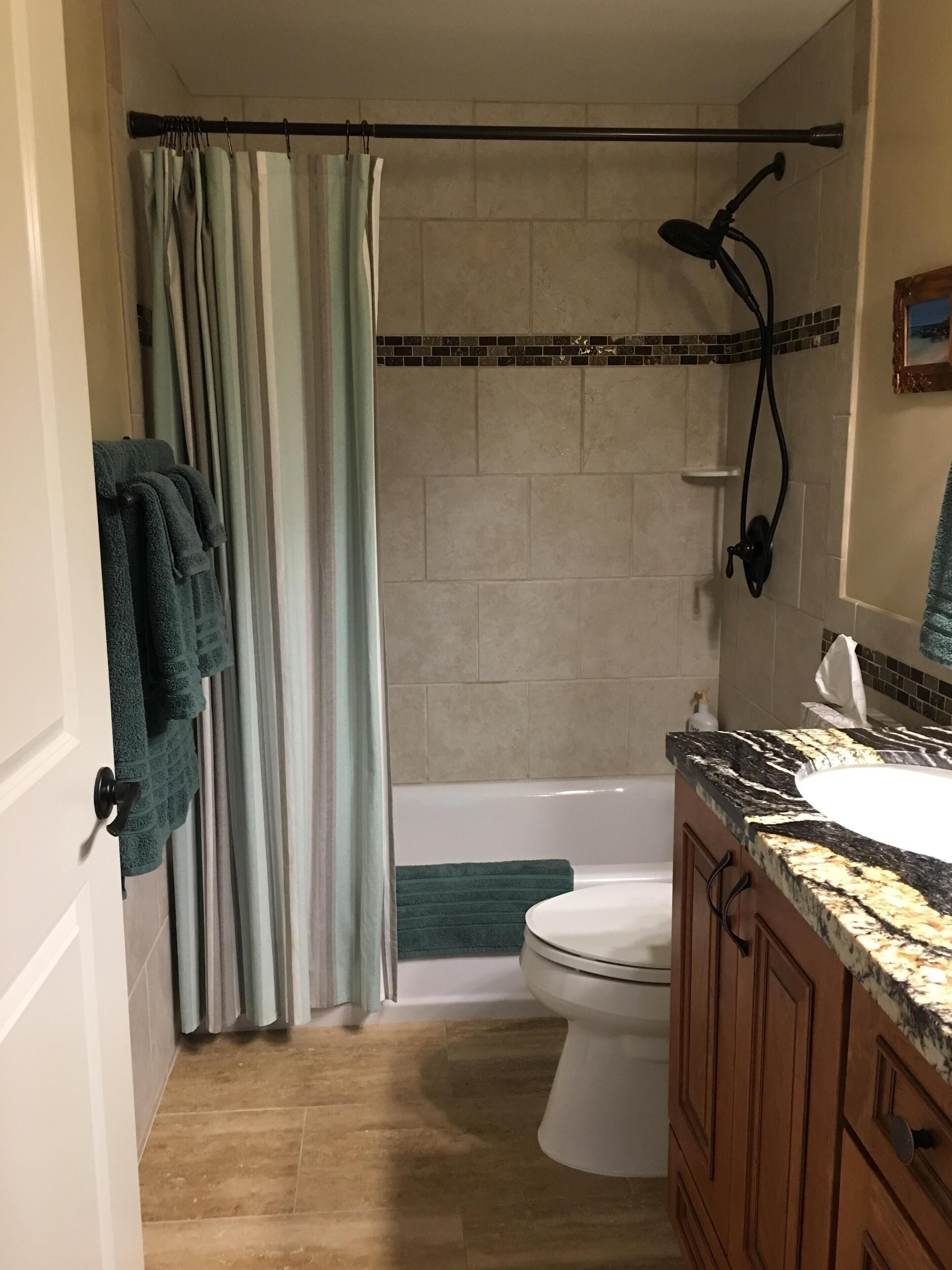 Hair dryer, towels, soap, toilet paper