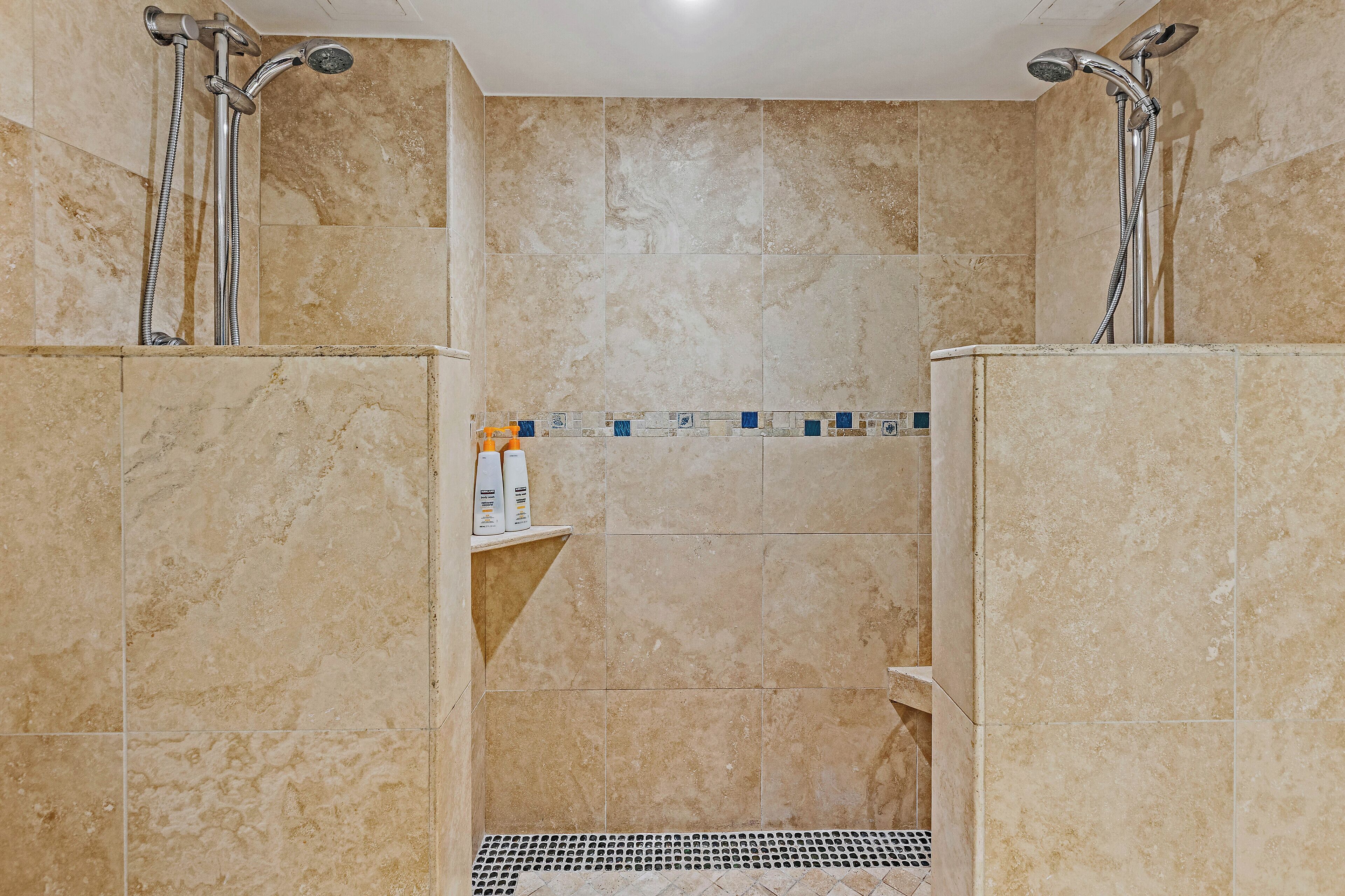 Bathtub, hair dryer, towels, soap