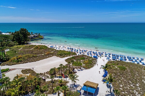 On the beach, sun loungers, beach towels