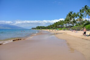 On the beach, sun loungers, beach towels