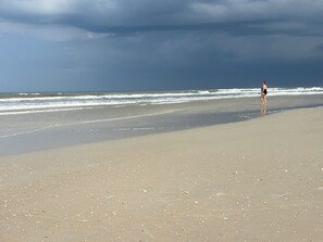On the beach, sun loungers, beach towels