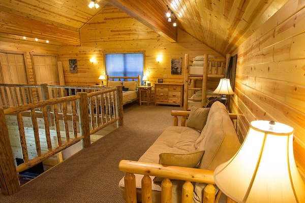 A futon, bunk bed, new dresser and screens for privacy were added in late 2016.
