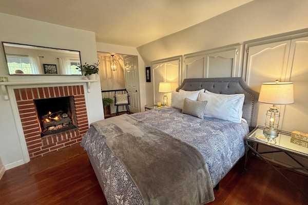 Cozy up to the fireplace in the upstairs bedroom