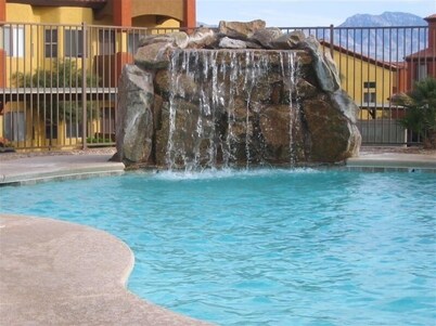 Clean & Cozy Condo with pool and trailer parking!