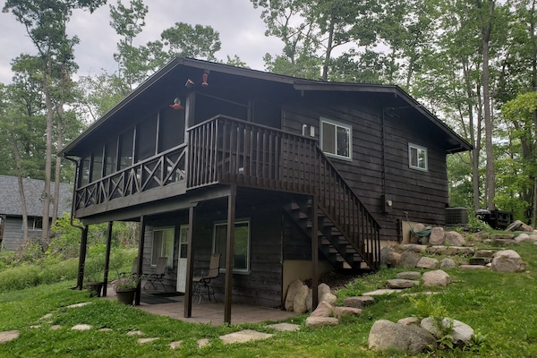 The screen porch over looks the lake. Arguably the best room in the county.