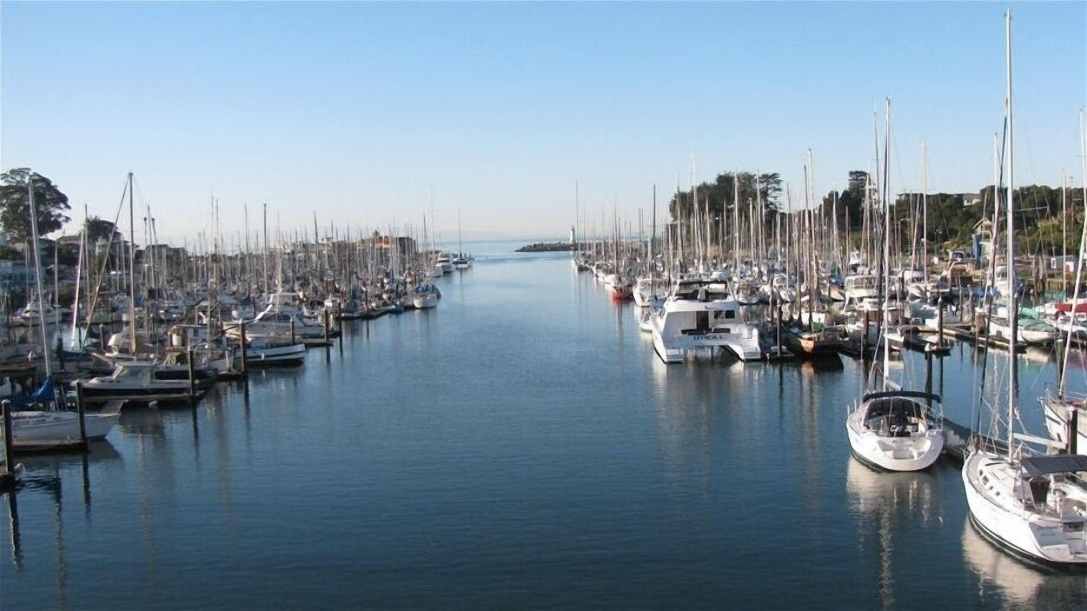 Yacht harbor close by with walking path around the harbor & out to lighthouse.