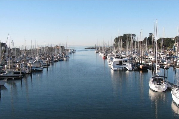 Yacht harbor close by with walking path around the harbor & out to lighthouse.