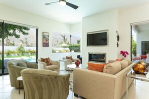 TV, fireplace, books, offices