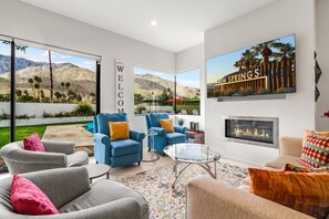 Smart TV, fireplace, books