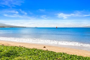 On the beach, sun loungers, beach towels
