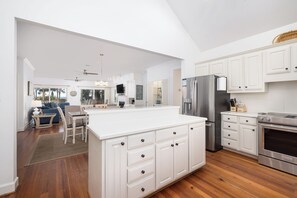 Fridge, dishwasher, coffee/tea maker, cookware/dishes/utensils