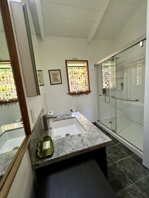 Bathtub, towels, soap, toilet paper
