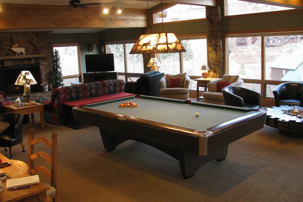 Open Concept Living Room with Multiple seating areas & GREAT Views of Mt. CB.