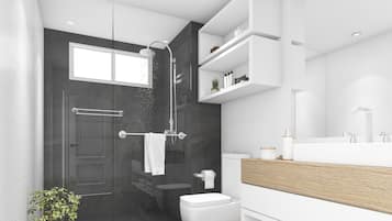 Een douche, een haardroger, handdoeken, shampoo