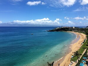 On the beach, sun-loungers, beach towels