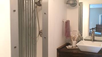 Shower, eco-friendly toiletries, hair dryer, towels