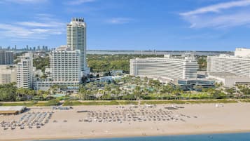 On the beach, sun loungers, beach towels