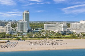 On the beach, sun-loungers, beach towels