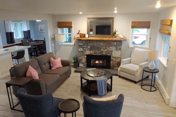 living room view from the stairs with gas fireplace insert