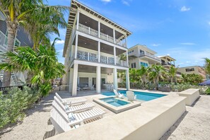 Outdoor pool, a heated pool - Luxury BEACHFRONT Beach House - Pool & Spa - Direct Gulf Access - Entire Home (Bradenton Beach)