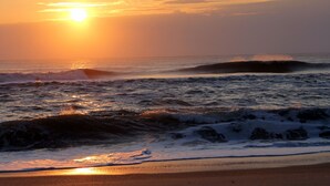 A beach scene with waves and a sunset. - SOUND FRONT!, Kite-In/Out! Sunsets! Dock!  (Salvo)