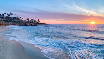 On the beach, sun-loungers, beach towels