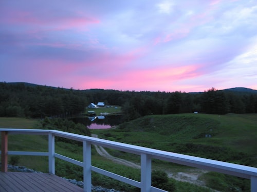 Beautiful Farmhouse located on 1200 acres of private bliss with a quiet pond.