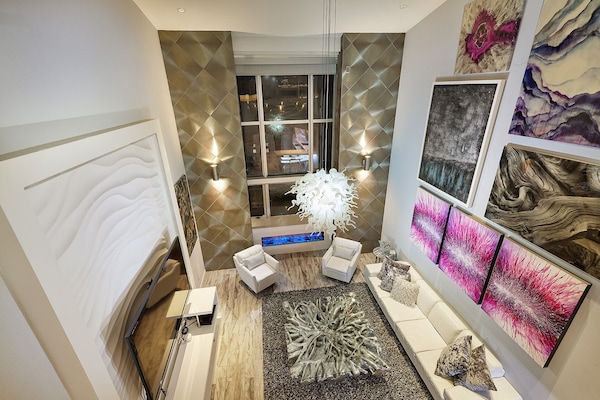 Incredible living room with two story ceilings. Even more dramatic in person.