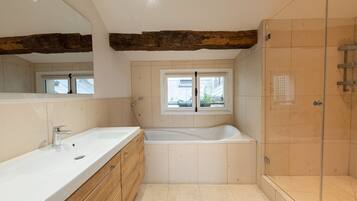 Bathtub, hair dryer, towels