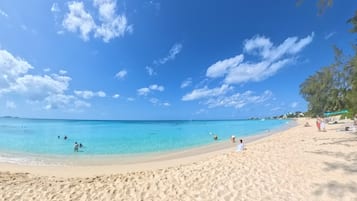On the beach, sun loungers, beach towels