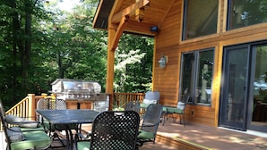 An outdoor deck with a wooden pergola, a grill, and outdoor furniture. - Chalet on 250 acres, Private, 1 Mi from Chautauqua Institution / Lake (Mayville)